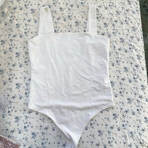 White Abercrombie body suit.